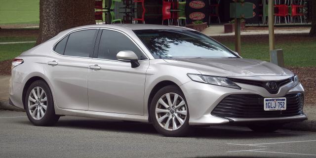 A silver midsize sedan